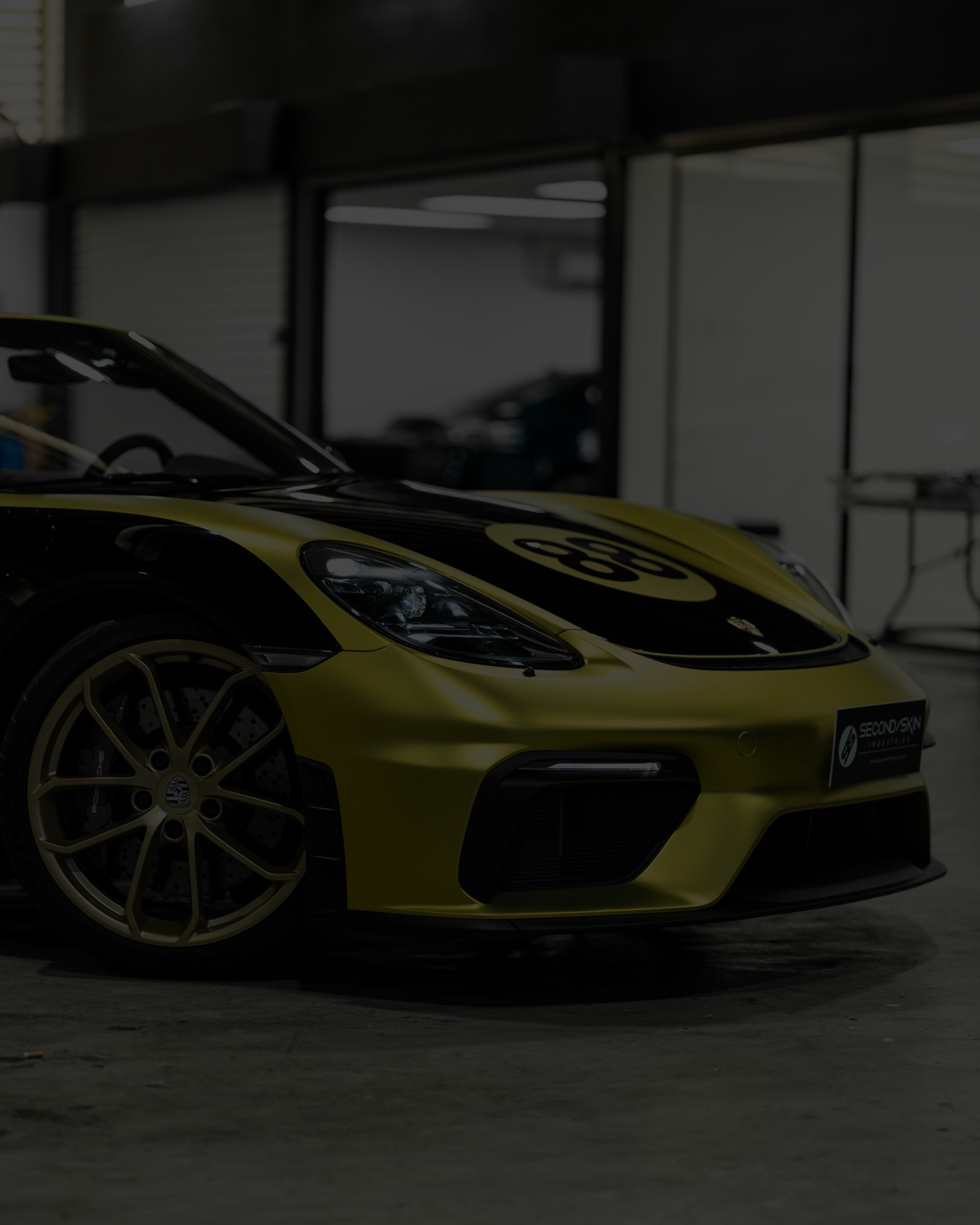 Porsche 718 in satin yellow wrap by Second Skin Industries
