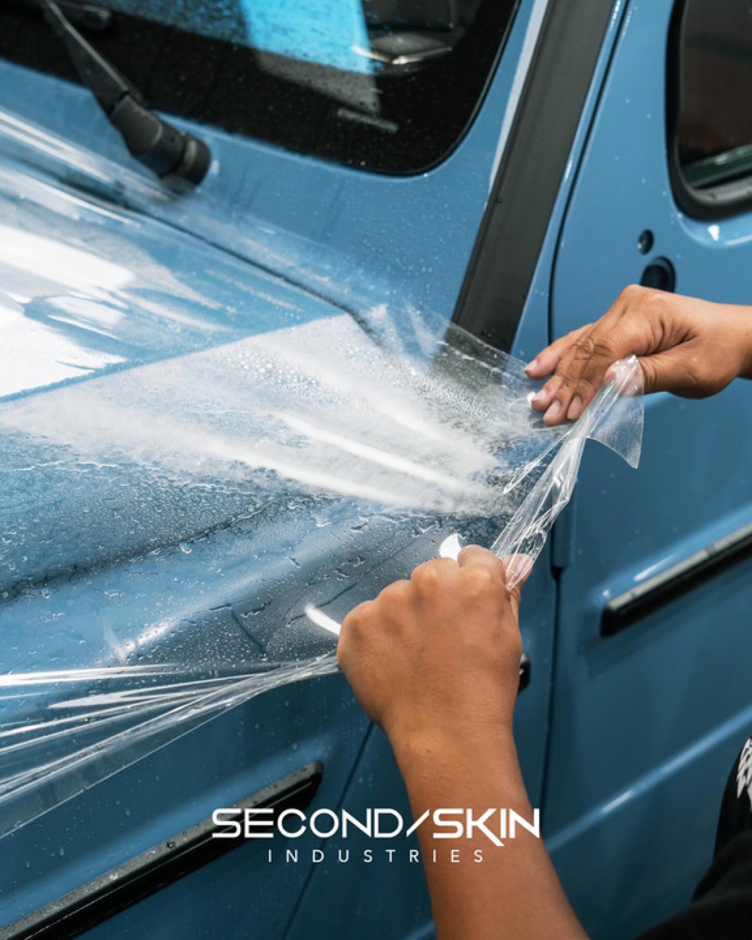 Protective film applied to vehicle glass and bodywork